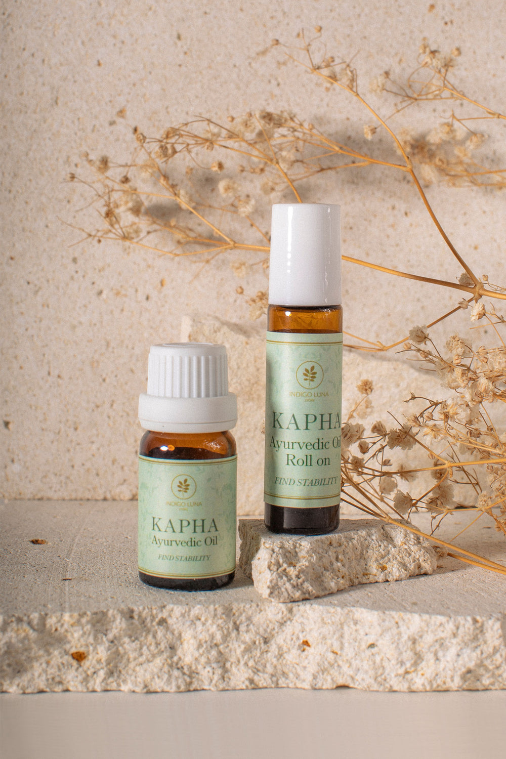 Ayurvedic essential oil for Kapha Dosha in a dropper bottle and in Roll on