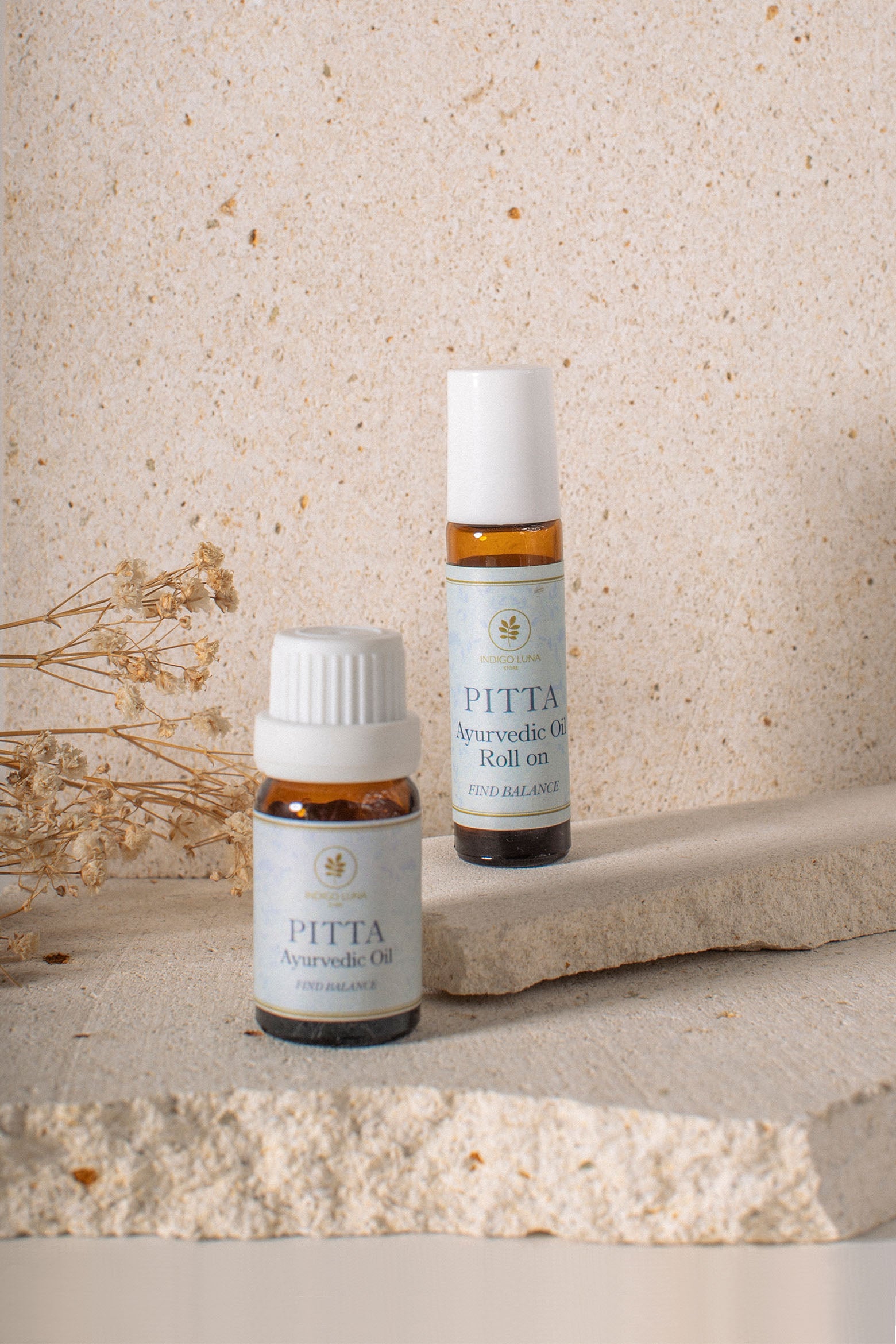Ayurvedic essential oil for Pitta Dosha in a dropper bottle and in Roll on